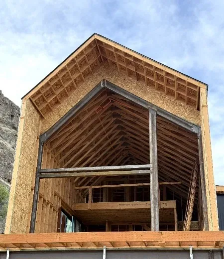 Steel and timber gable framing on a new build